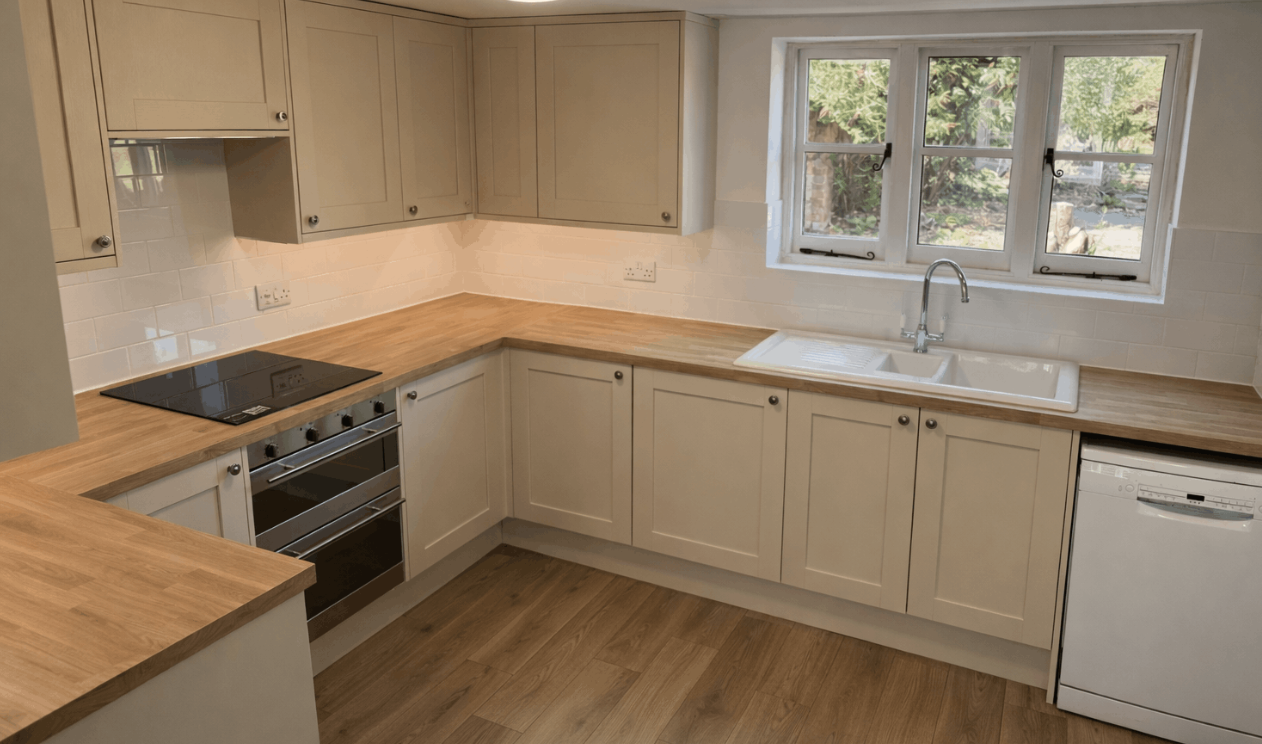 Completed shaker kitchen installation with oak worktops